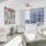 Four white armchairs overlooking terrace at Eliot on Ocean