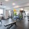 Large fitness center with cardio and weight lifting equipment.