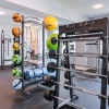 State of the art fitness center with free wights, spin bikes, cardio equipment and views of the ocean